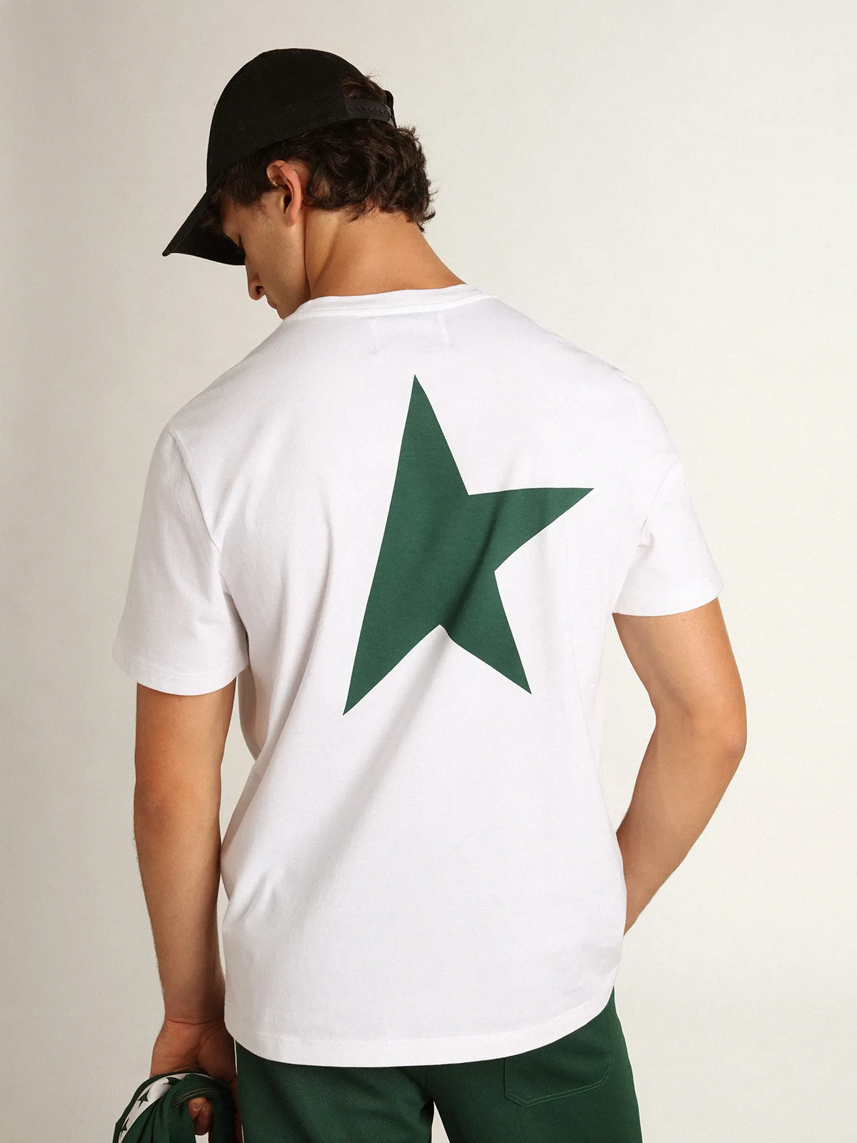 Men's white T-shirt with contrasting green logo and star