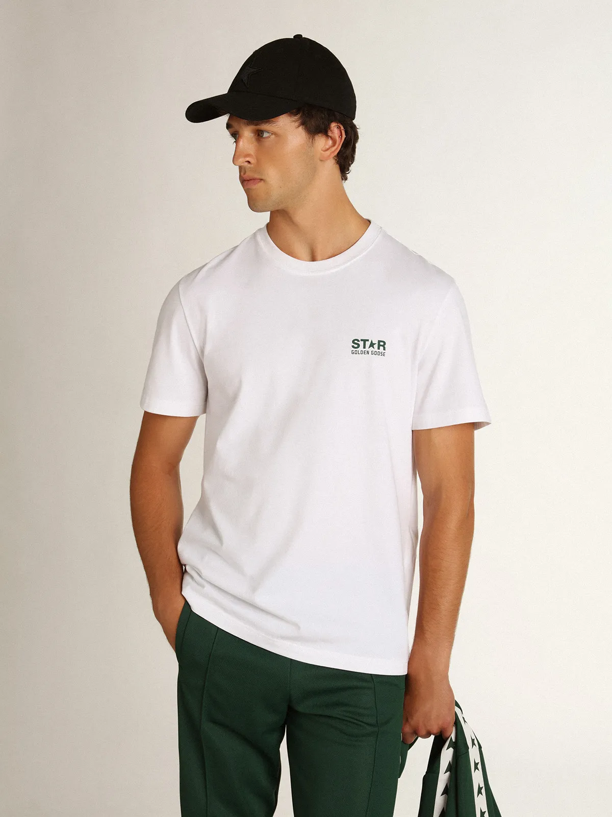 Men's white T-shirt with contrasting green logo and star