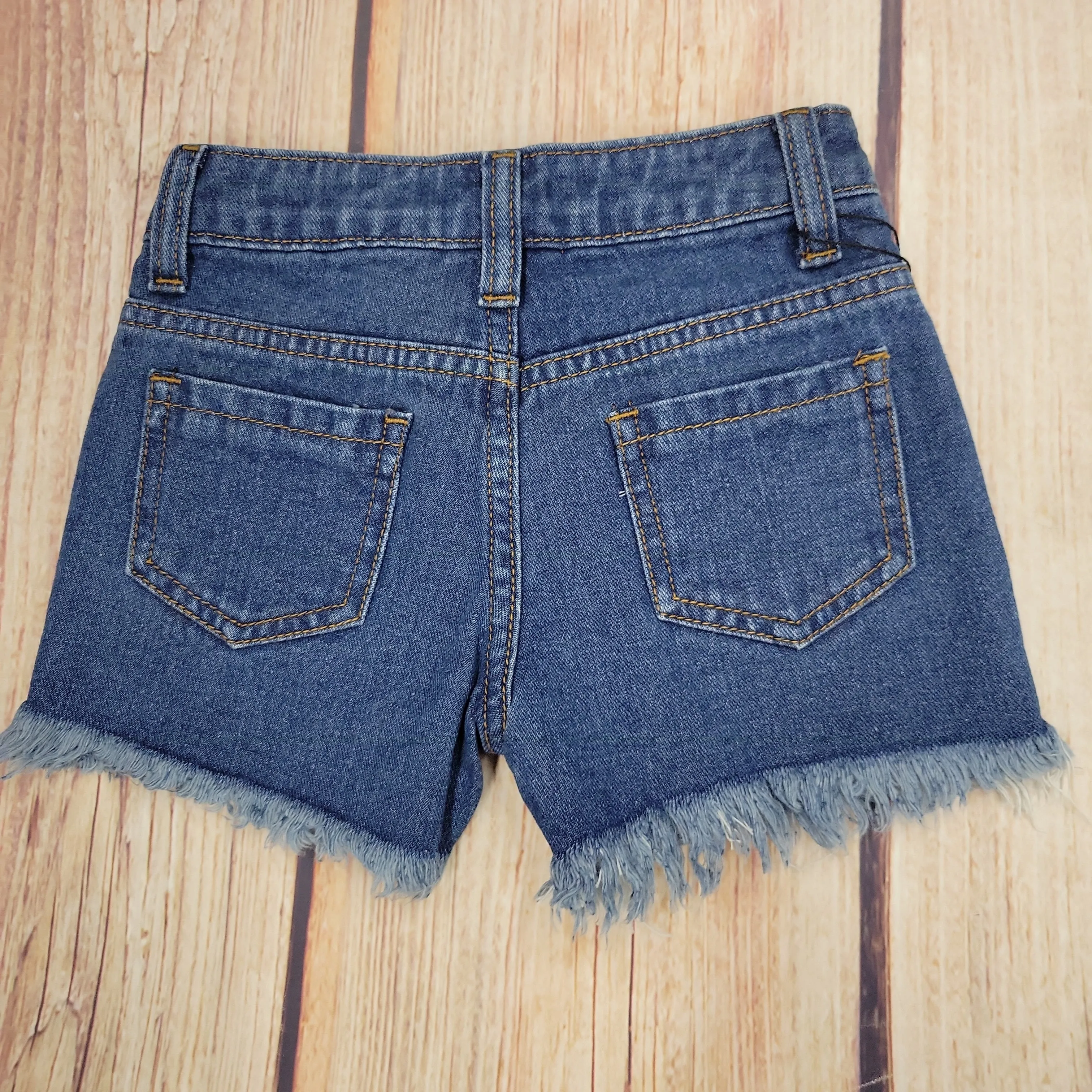 M.L.  KIDS DESTRUCTED DENIM SHORTS.